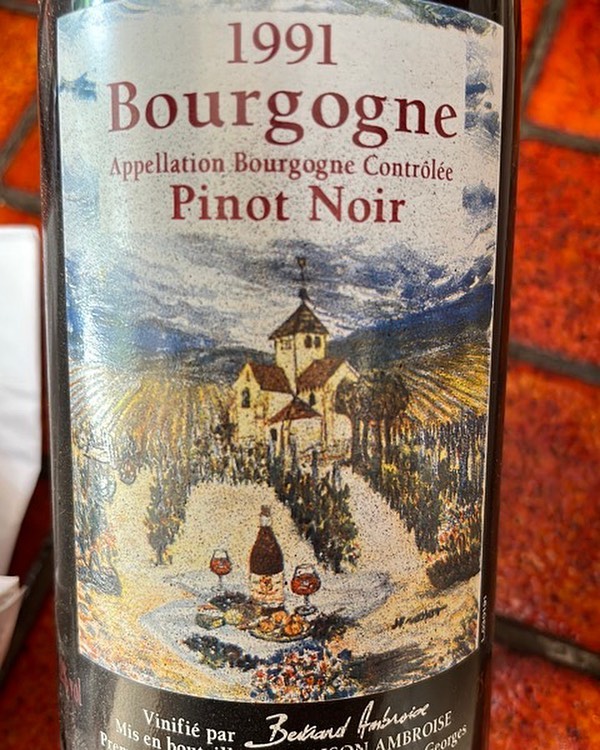 Pinot noir inspires art. Very rare bottle of Pinot Noir with painted label by local artiste #JFVossot for Maison Ambroise in Nuits-Saint-Georges… 1991 was just to drink in 2022 #nuitssaintgeorges #ilovepinotnoir #pinotnoir #bourgogne #winelabelart #winelabel